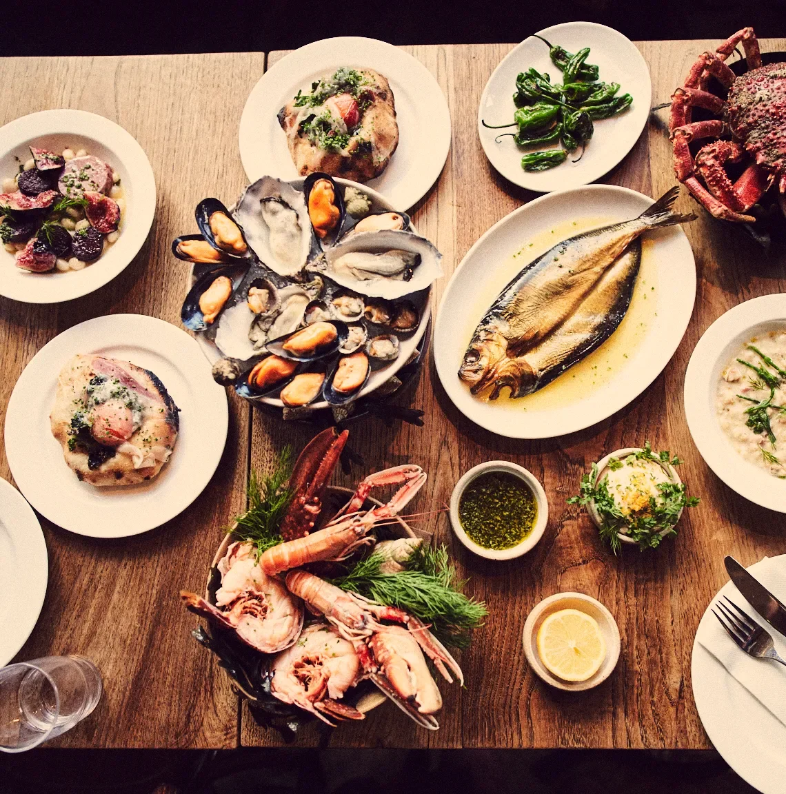 The original approved Taste Discovery opening photograph, a table of dishes