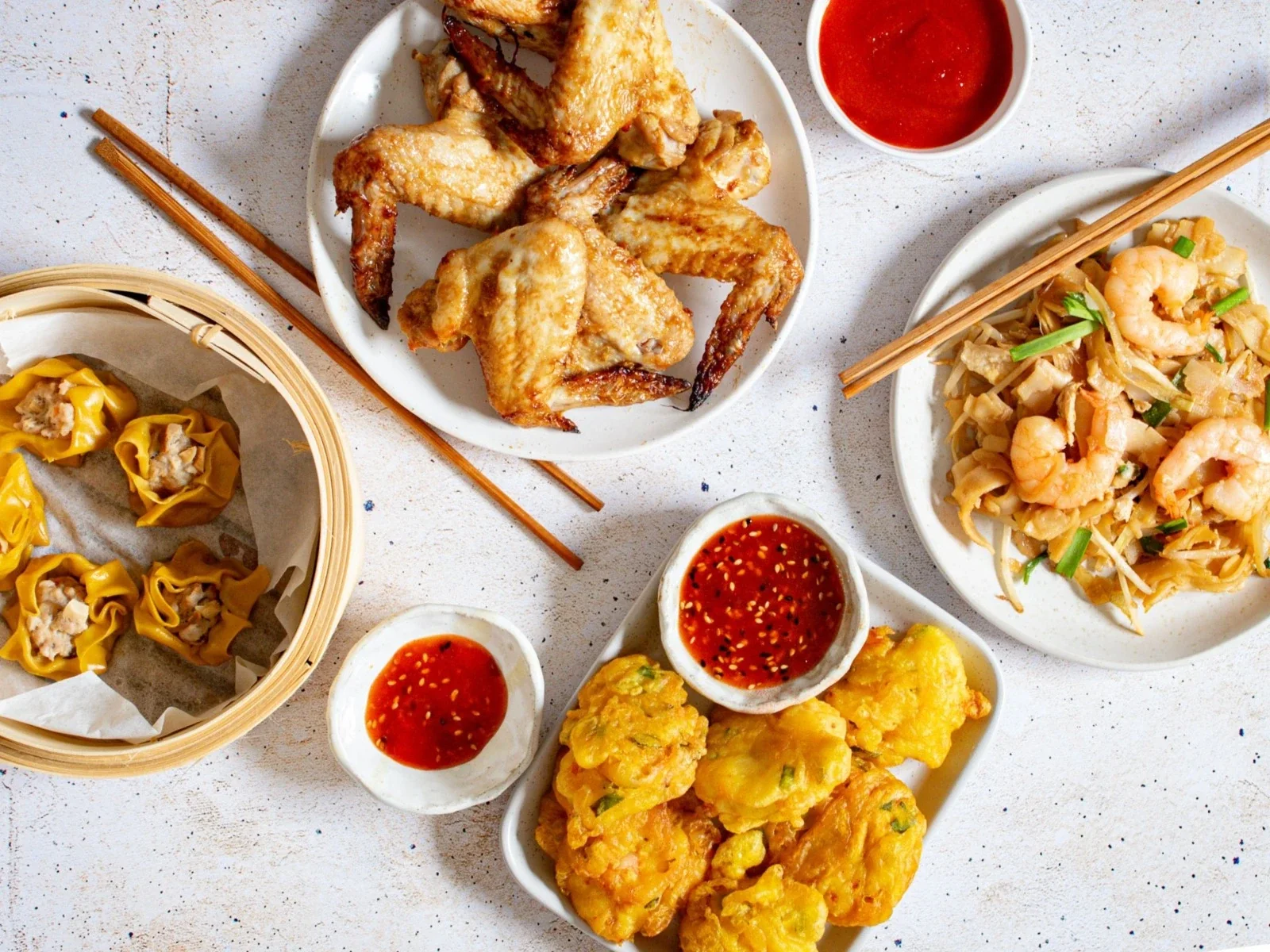 The approved Taste Discovery results photograph, a shared table of food